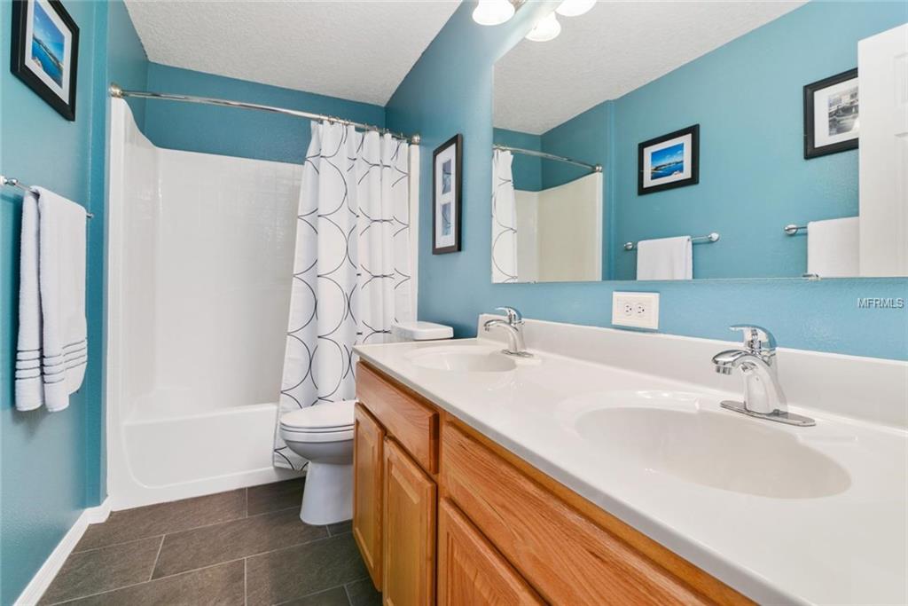 129 MILESTONE DRIVE, HAINES CITY, Florida 33844, 4 Bedrooms Bedrooms, 9 Rooms Rooms,2 BathroomsBathrooms,Residential,For sale,MILESTONE,S4856928