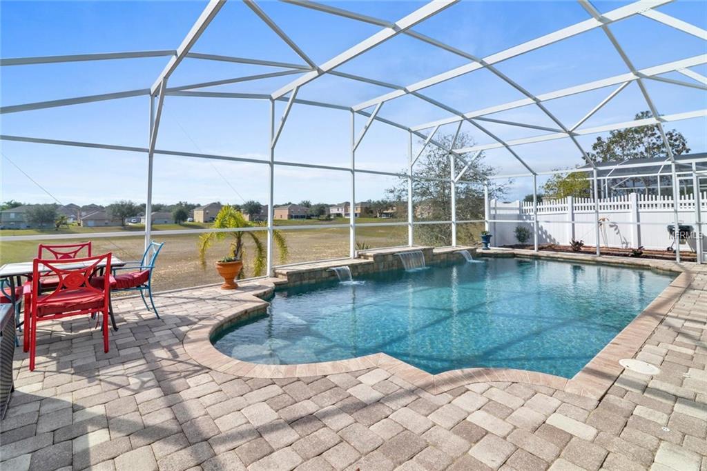 129 MILESTONE DRIVE, HAINES CITY, Florida 33844, 4 Bedrooms Bedrooms, 9 Rooms Rooms,2 BathroomsBathrooms,Residential,For sale,MILESTONE,S4856928