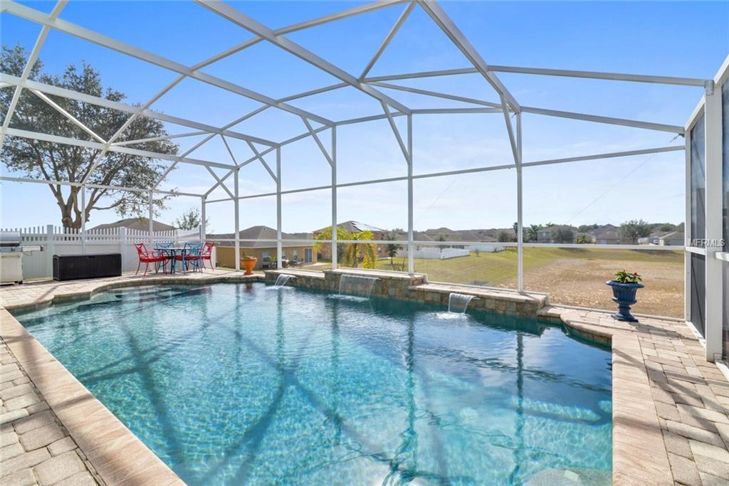 129 MILESTONE DRIVE, HAINES CITY, Florida 33844, 4 Bedrooms Bedrooms, 9 Rooms Rooms,2 BathroomsBathrooms,Residential,For sale,MILESTONE,S4856928