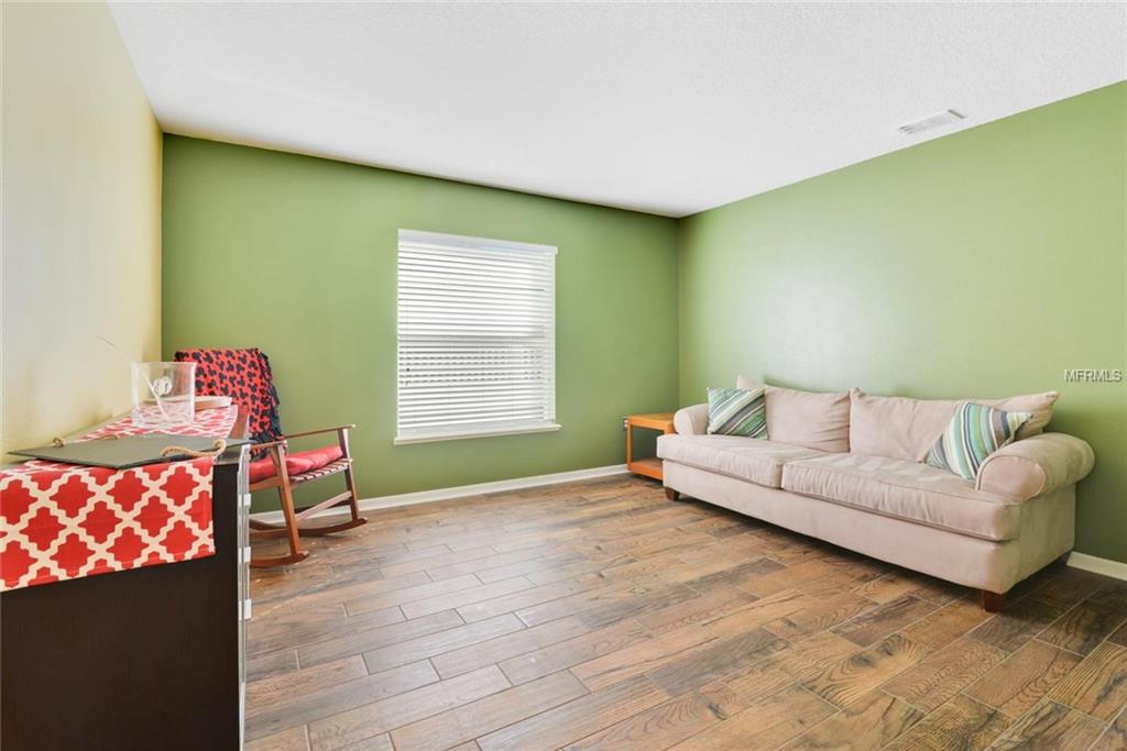 129 MILESTONE DRIVE, HAINES CITY, Florida 33844, 4 Bedrooms Bedrooms, 9 Rooms Rooms,2 BathroomsBathrooms,Residential,For sale,MILESTONE,S4856928