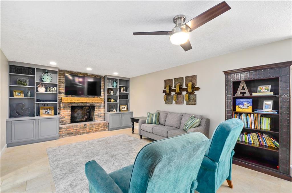 7920 SUMMER RIDGE PLACE, ORLANDO, Florida 32819, 4 Bedrooms Bedrooms, 9 Rooms Rooms,2 BathroomsBathrooms,Residential,For sale,SUMMER RIDGE,O5561420