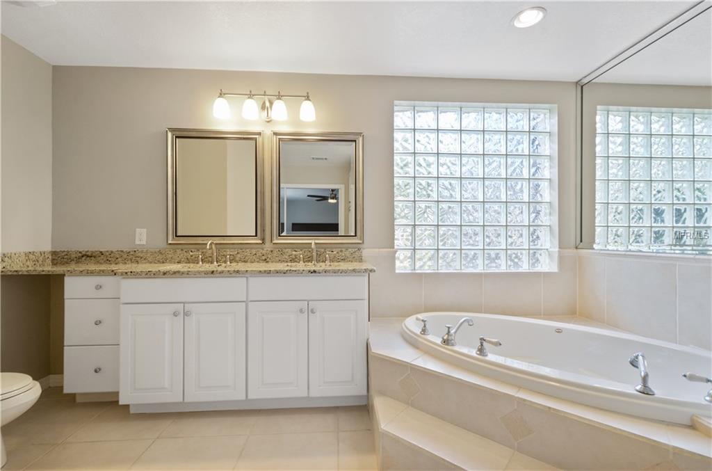 7920 SUMMER RIDGE PLACE, ORLANDO, Florida 32819, 4 Bedrooms Bedrooms, 9 Rooms Rooms,2 BathroomsBathrooms,Residential,For sale,SUMMER RIDGE,O5561420