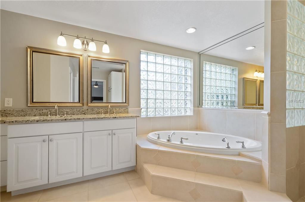 7920 SUMMER RIDGE PLACE, ORLANDO, Florida 32819, 4 Bedrooms Bedrooms, 9 Rooms Rooms,2 BathroomsBathrooms,Residential,For sale,SUMMER RIDGE,O5561420