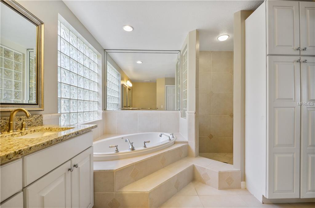 7920 SUMMER RIDGE PLACE, ORLANDO, Florida 32819, 4 Bedrooms Bedrooms, 9 Rooms Rooms,2 BathroomsBathrooms,Residential,For sale,SUMMER RIDGE,O5561420