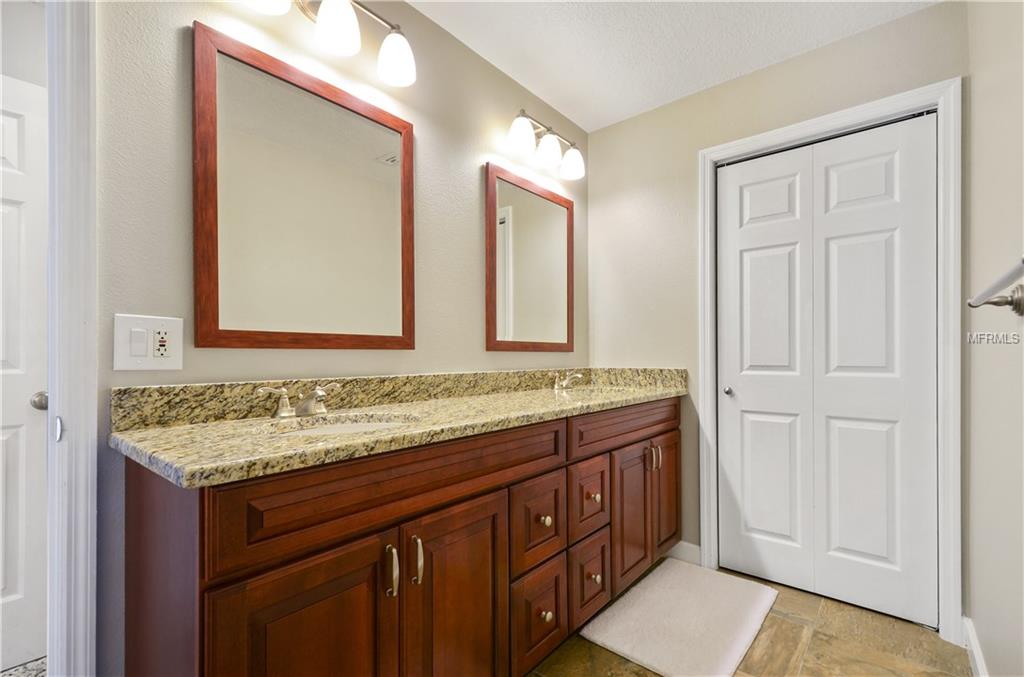 7920 SUMMER RIDGE PLACE, ORLANDO, Florida 32819, 4 Bedrooms Bedrooms, 9 Rooms Rooms,2 BathroomsBathrooms,Residential,For sale,SUMMER RIDGE,O5561420