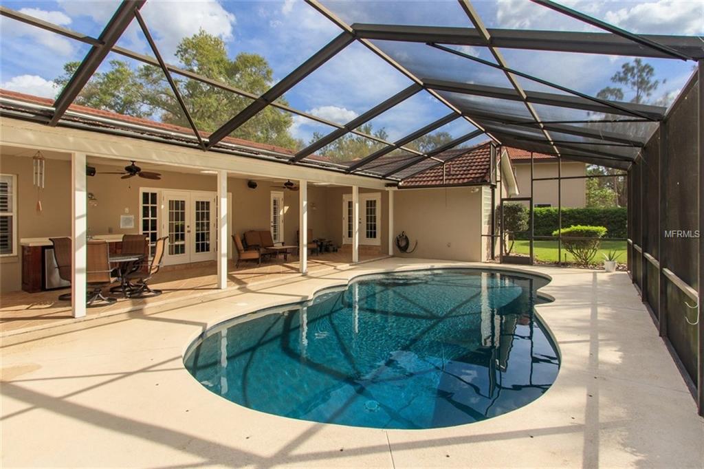 7920 SUMMER RIDGE PLACE, ORLANDO, Florida 32819, 4 Bedrooms Bedrooms, 9 Rooms Rooms,2 BathroomsBathrooms,Residential,For sale,SUMMER RIDGE,O5561420