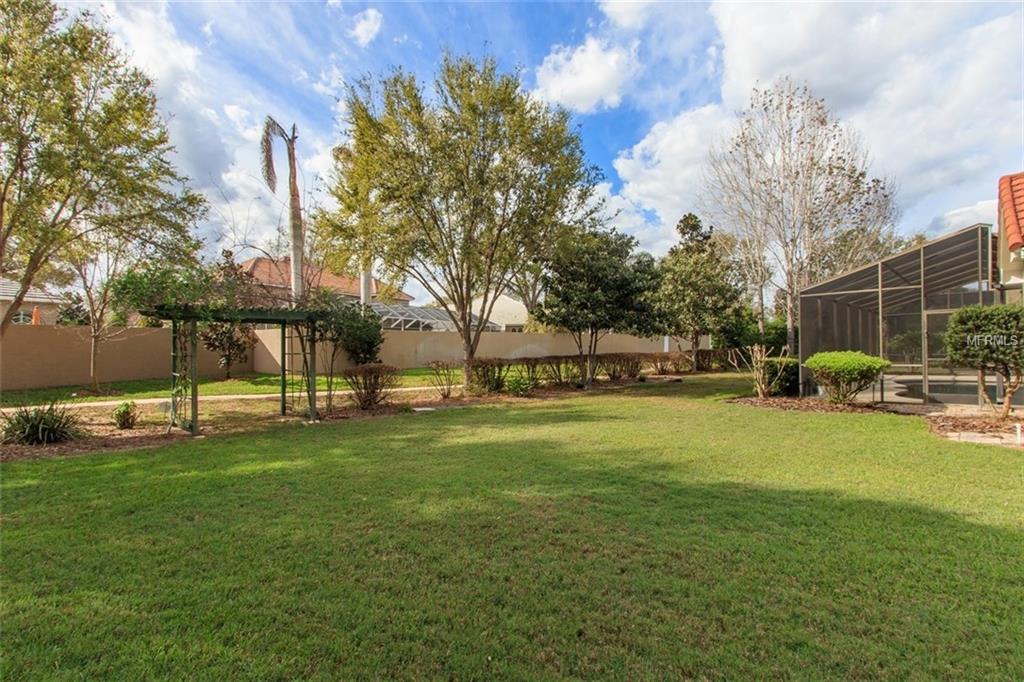 7920 SUMMER RIDGE PLACE, ORLANDO, Florida 32819, 4 Bedrooms Bedrooms, 9 Rooms Rooms,2 BathroomsBathrooms,Residential,For sale,SUMMER RIDGE,O5561420