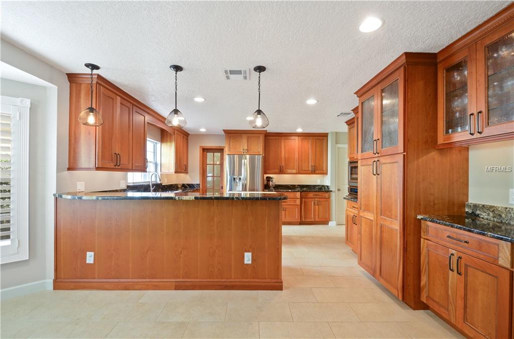 7920 SUMMER RIDGE PLACE, ORLANDO, Florida 32819, 4 Bedrooms Bedrooms, 9 Rooms Rooms,2 BathroomsBathrooms,Residential,For sale,SUMMER RIDGE,O5561420