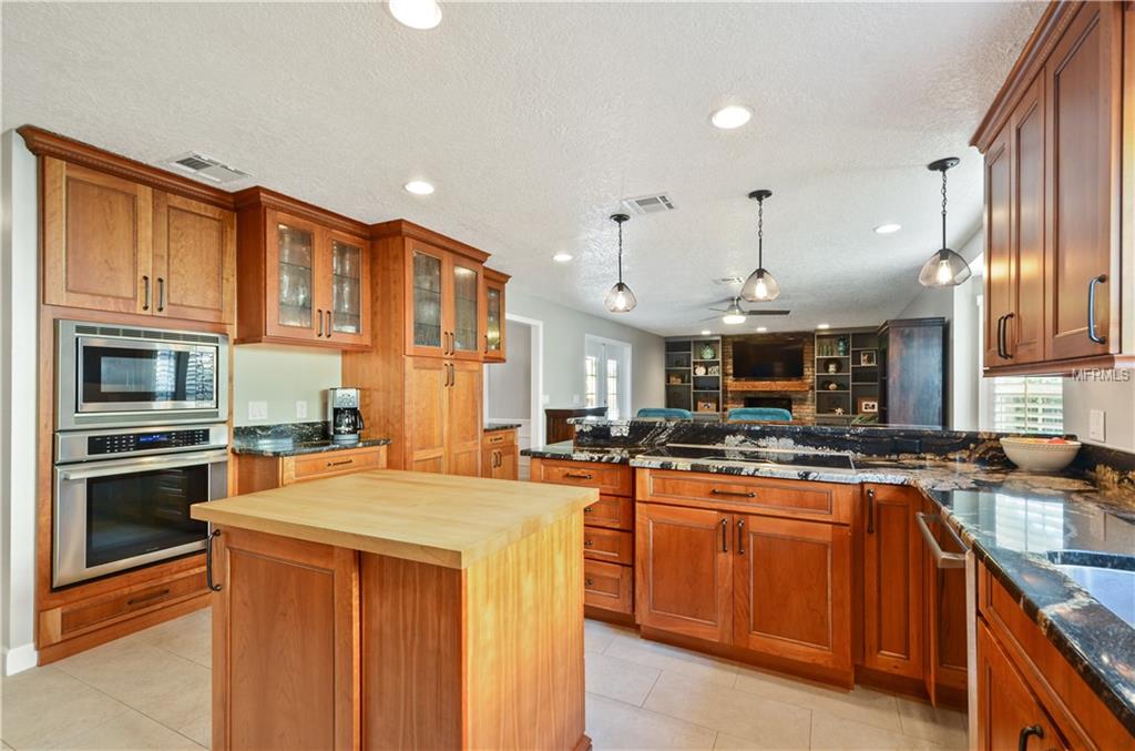 7920 SUMMER RIDGE PLACE, ORLANDO, Florida 32819, 4 Bedrooms Bedrooms, 9 Rooms Rooms,2 BathroomsBathrooms,Residential,For sale,SUMMER RIDGE,O5561420