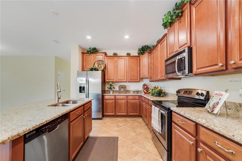 1557 THETFORD CIRCLE, ORLANDO, Florida 32824, 4 Bedrooms Bedrooms, 3 Rooms Rooms,4 BathroomsBathrooms,Residential,For sale,THETFORD,O5541551