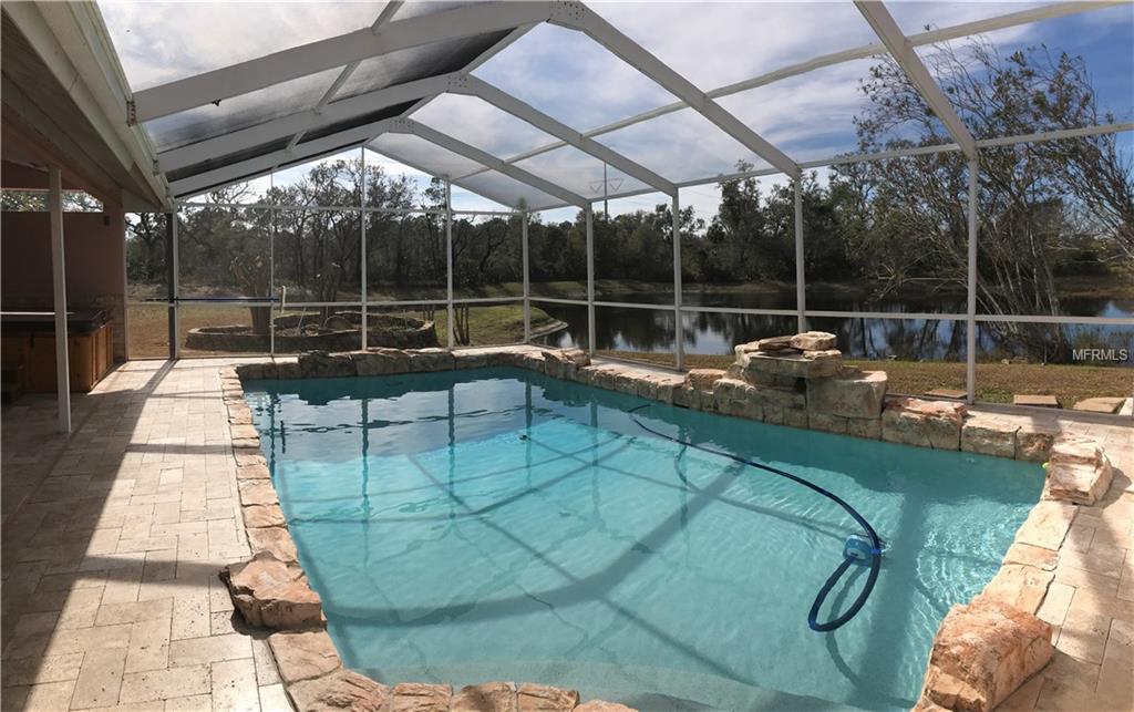 3212 HEARTHSTONE COURT, HOLIDAY, Florida 34691, 4 Bedrooms Bedrooms, 5 Rooms Rooms,2 BathroomsBathrooms,Residential,For sale,HEARTHSTONE,U7845738