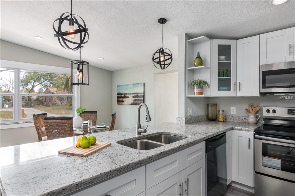 2109 E FLORA STREET, TAMPA, Florida 33610, 4 Bedrooms Bedrooms, 4 Rooms Rooms,2 BathroomsBathrooms,Residential,For sale,FLORA,T2926122