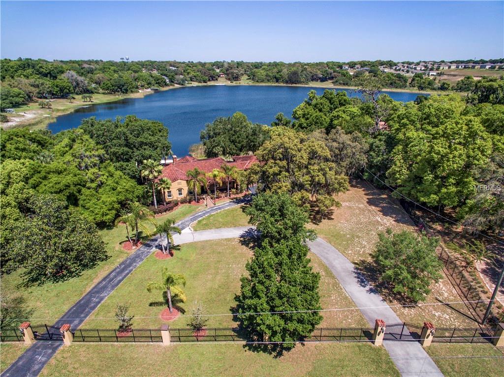 1909 COUNTRY CLUB DRIVE, EUSTIS, Florida 32726, 4 Bedrooms Bedrooms, 6 Rooms Rooms,4 BathroomsBathrooms,Residential,For sale,COUNTRY CLUB,O5432916