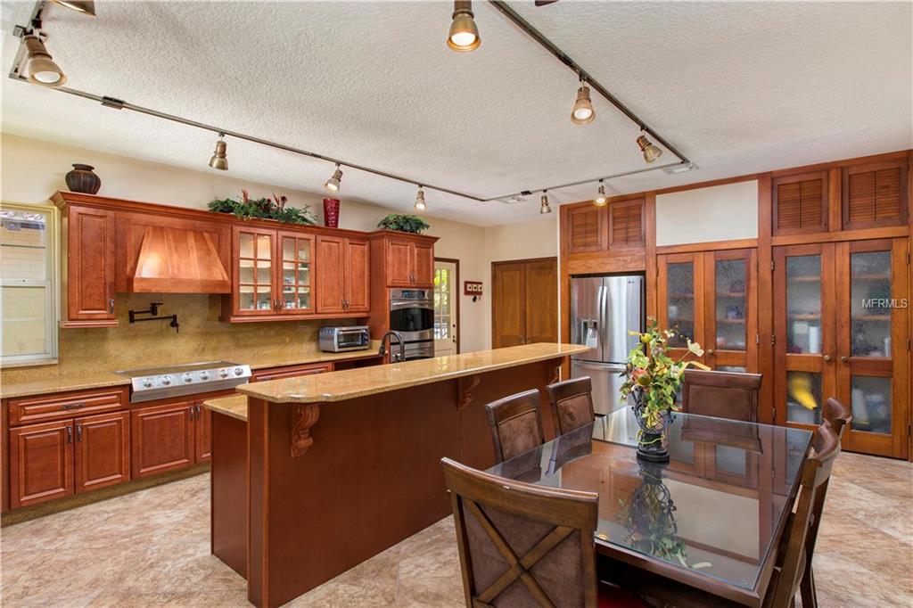 1909 COUNTRY CLUB DRIVE, EUSTIS, Florida 32726, 4 Bedrooms Bedrooms, 6 Rooms Rooms,4 BathroomsBathrooms,Residential,For sale,COUNTRY CLUB,O5432916