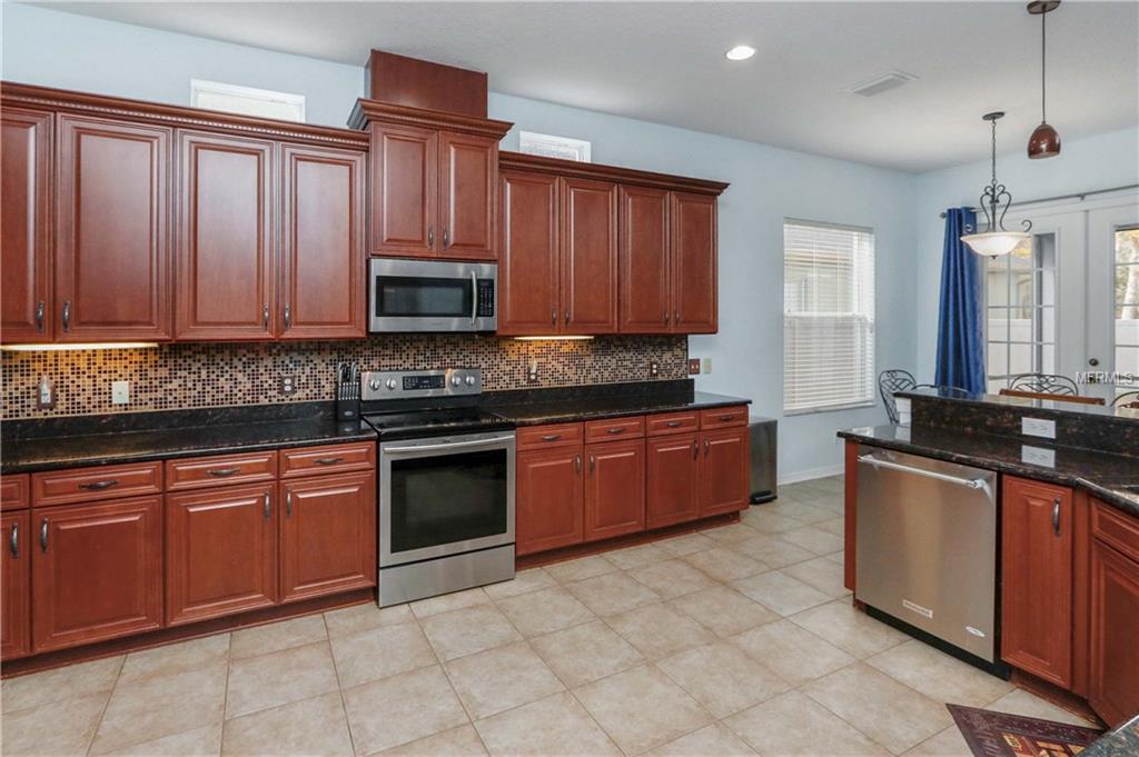 7813 GRASMERE DRIVE, LAND O LAKES, Florida 34637, 4 Bedrooms Bedrooms, 8 Rooms Rooms,3 BathroomsBathrooms,Residential,For sale,GRASMERE,U7845217