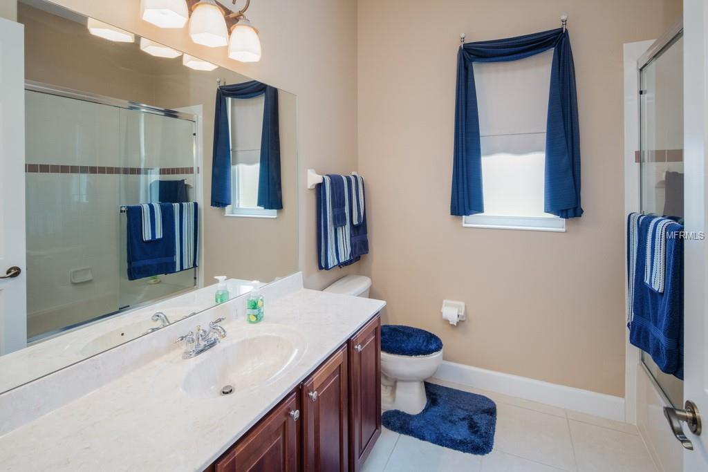 5921 OXFORD MOOR BOULEVARD, WINDERMERE, Florida 34786, 4 Bedrooms Bedrooms, 9 Rooms Rooms,3 BathroomsBathrooms,Residential,For sale,OXFORD MOOR,O5558083