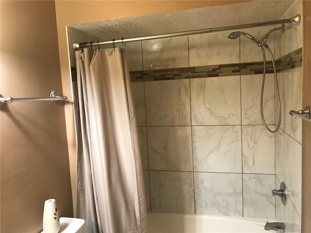 5560 LONG LAKE DRIVE, ORLANDO, Florida 32810, 3 Bedrooms Bedrooms, 4 Rooms Rooms,2 BathroomsBathrooms,Residential,For sale,LONG LAKE,O5561949