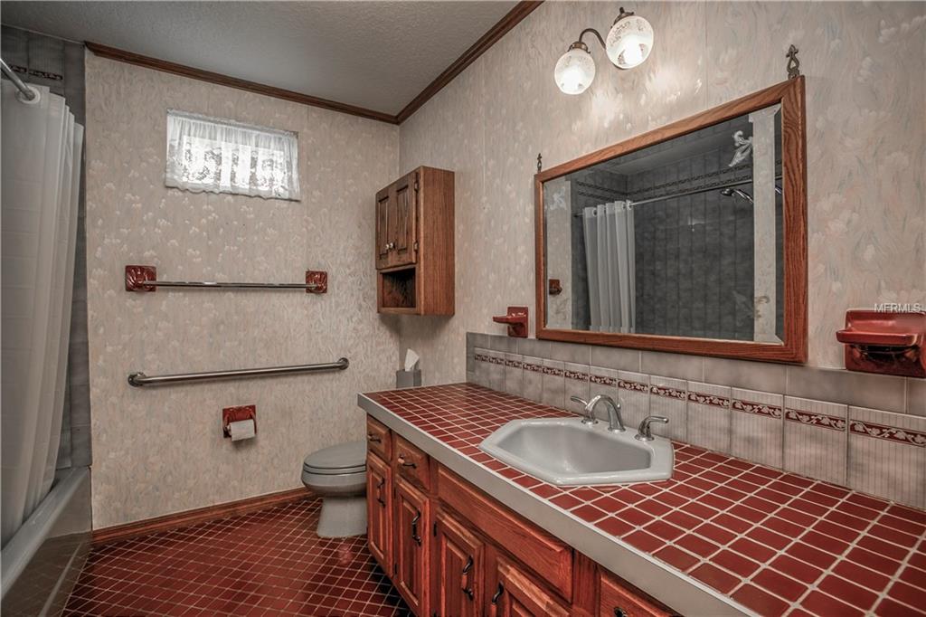 6241 BAYSIDE DRIVE, NEW PORT RICHEY, Florida 34652, 4 Bedrooms Bedrooms, 9 Rooms Rooms,3 BathroomsBathrooms,Residential,For sale,BAYSIDE,W7635028