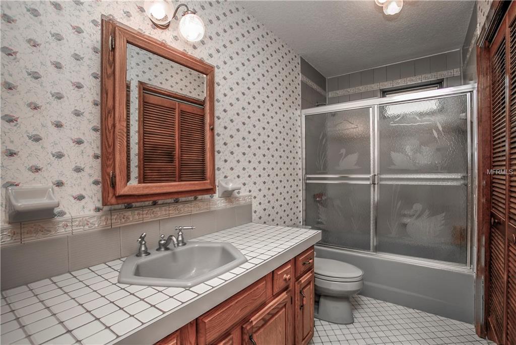 6241 BAYSIDE DRIVE, NEW PORT RICHEY, Florida 34652, 4 Bedrooms Bedrooms, 9 Rooms Rooms,3 BathroomsBathrooms,Residential,For sale,BAYSIDE,W7635028