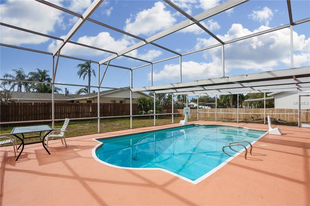 8702 COBBLESTONE DRIVE, TAMPA, Florida 33615, 5 Bedrooms Bedrooms, 9 Rooms Rooms,3 BathroomsBathrooms,Residential,For sale,COBBLESTONE,T2926683