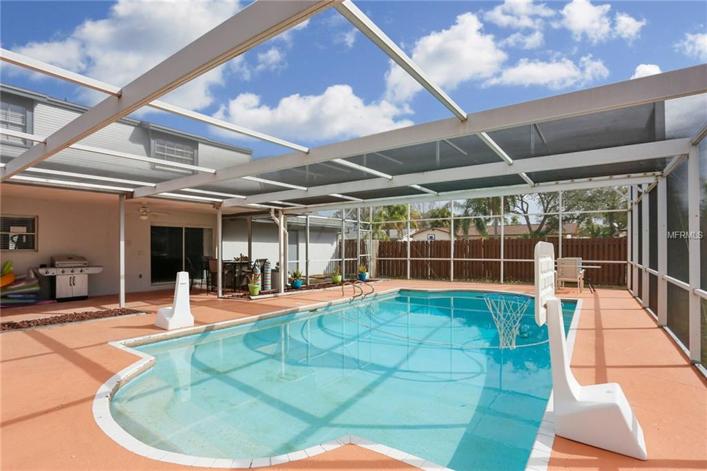 8702 COBBLESTONE DRIVE, TAMPA, Florida 33615, 5 Bedrooms Bedrooms, 9 Rooms Rooms,3 BathroomsBathrooms,Residential,For sale,COBBLESTONE,T2926683