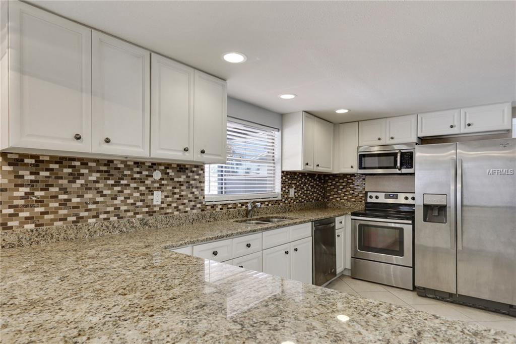 8702 COBBLESTONE DRIVE, TAMPA, Florida 33615, 5 Bedrooms Bedrooms, 9 Rooms Rooms,3 BathroomsBathrooms,Residential,For sale,COBBLESTONE,T2926683