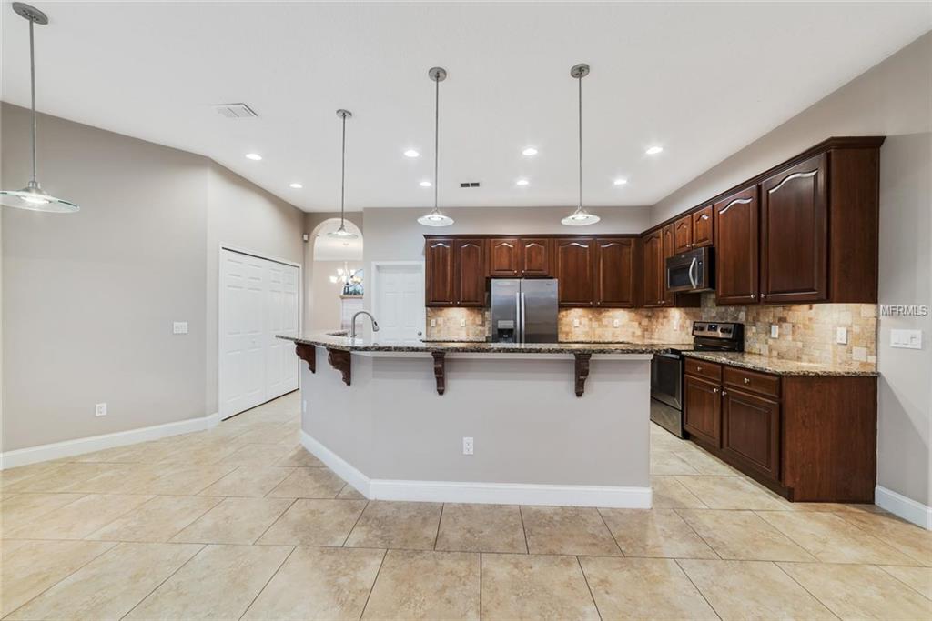 1282 OAKFORD PLACE, OVIEDO, Florida 32765, 4 Bedrooms Bedrooms, 8 Rooms Rooms,3 BathroomsBathrooms,Residential,For sale,OAKFORD,O5553869