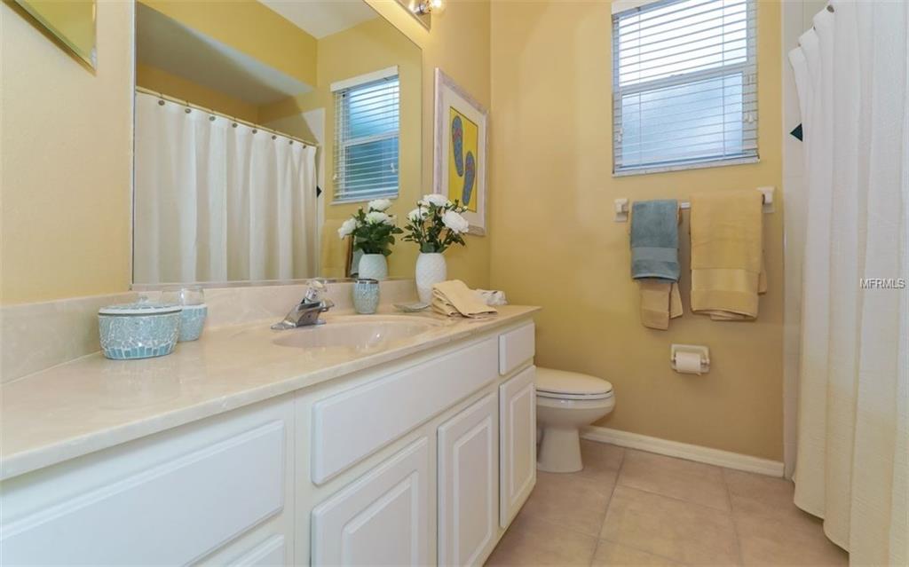 7715 LATROBE COURT, LAKEWOOD RANCH, Florida 34202, 4 Bedrooms Bedrooms, 7 Rooms Rooms,2 BathroomsBathrooms,Residential,For sale,LATROBE,A4208915