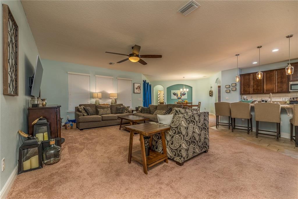 1039 LENA RUN COURT, WINTER HAVEN, Florida 33880, 4 Bedrooms Bedrooms, 8 Rooms Rooms,3 BathroomsBathrooms,Residential,For sale,LENA RUN,L4725494