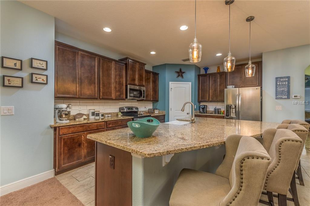 1039 LENA RUN COURT, WINTER HAVEN, Florida 33880, 4 Bedrooms Bedrooms, 8 Rooms Rooms,3 BathroomsBathrooms,Residential,For sale,LENA RUN,L4725494