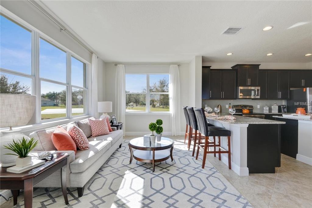 2155 WHITE DAHLIA DRIVE, APOPKA, Florida 32712, 3 Bedrooms Bedrooms, 10 Rooms Rooms,2 BathroomsBathrooms,Residential,For sale,WHITE DAHLIA,W7635487