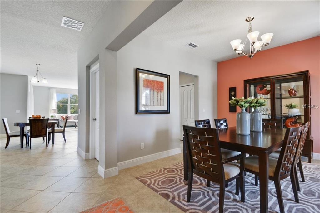 2155 WHITE DAHLIA DRIVE, APOPKA, Florida 32712, 3 Bedrooms Bedrooms, 10 Rooms Rooms,2 BathroomsBathrooms,Residential,For sale,WHITE DAHLIA,W7635487