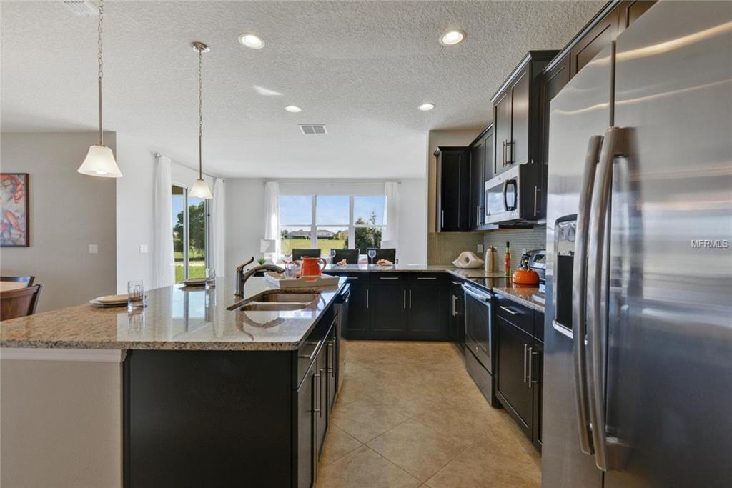 2155 WHITE DAHLIA DRIVE, APOPKA, Florida 32712, 3 Bedrooms Bedrooms, 10 Rooms Rooms,2 BathroomsBathrooms,Residential,For sale,WHITE DAHLIA,W7635487