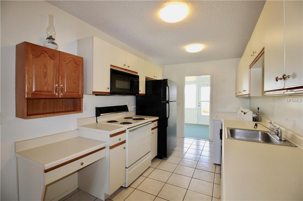 257 WINTER RIDGE BOULEVARD, WINTER HAVEN, Florida 33881, 2 Bedrooms Bedrooms, 4 Rooms Rooms,2 BathroomsBathrooms,Residential,For sale,WINTER RIDGE,P4718545