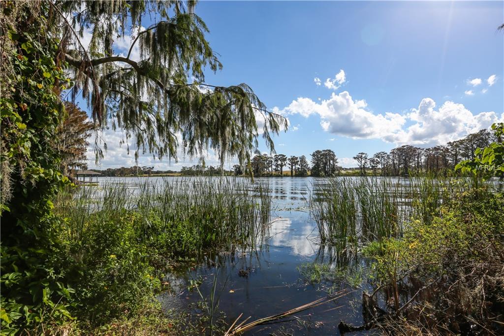 27955 LAKE JEM ROAD, MOUNT DORA, Florida 32757, 4 Bedrooms Bedrooms, 7 Rooms Rooms,3 BathroomsBathrooms,Residential,For sale,LAKE JEM,G4850204