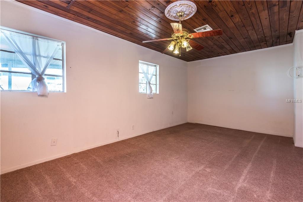 205 N PALM AVENUE, HOWEY IN THE HILLS, Florida 34737, 3 Bedrooms Bedrooms, 6 Rooms Rooms,2 BathroomsBathrooms,Residential,For sale,PALM,G4851781