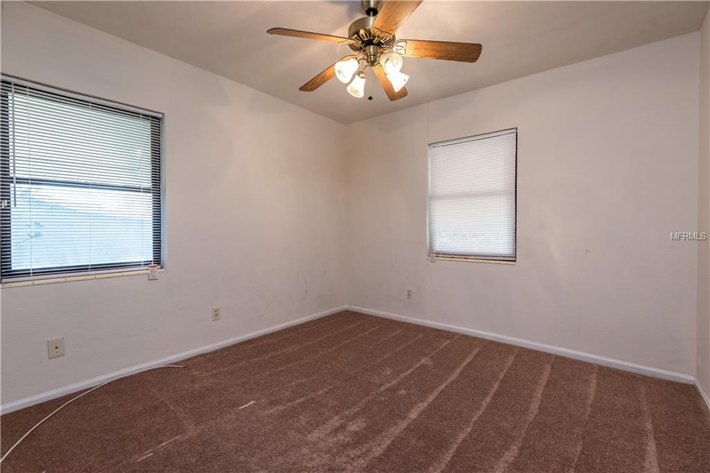 205 N PALM AVENUE, HOWEY IN THE HILLS, Florida 34737, 3 Bedrooms Bedrooms, 6 Rooms Rooms,2 BathroomsBathrooms,Residential,For sale,PALM,G4851781