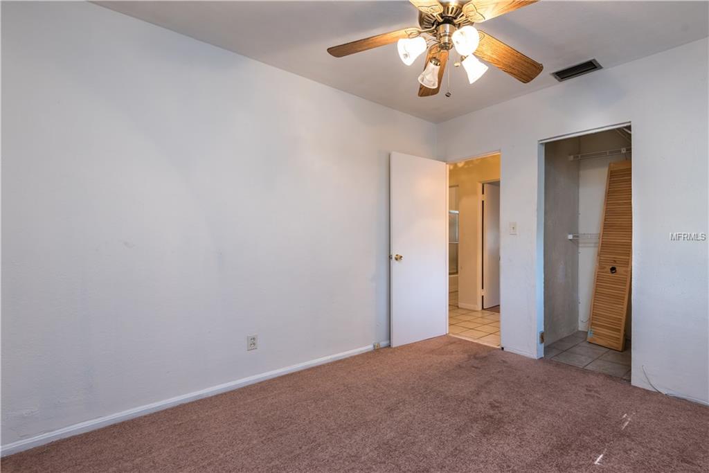 205 N PALM AVENUE, HOWEY IN THE HILLS, Florida 34737, 3 Bedrooms Bedrooms, 6 Rooms Rooms,2 BathroomsBathrooms,Residential,For sale,PALM,G4851781