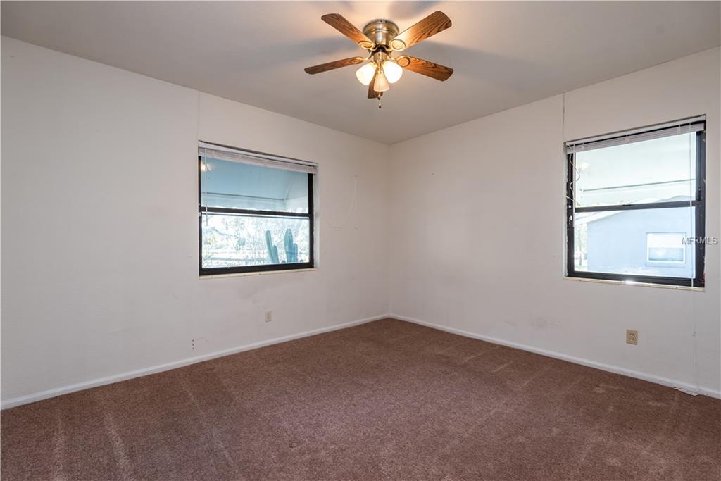 205 N PALM AVENUE, HOWEY IN THE HILLS, Florida 34737, 3 Bedrooms Bedrooms, 6 Rooms Rooms,2 BathroomsBathrooms,Residential,For sale,PALM,G4851781