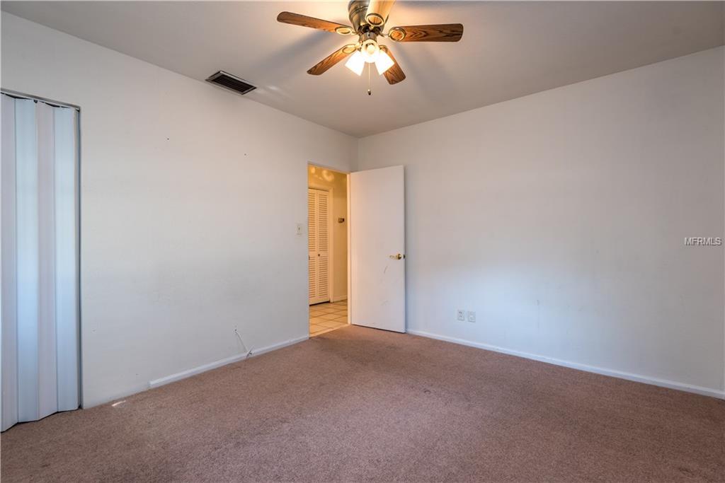 205 N PALM AVENUE, HOWEY IN THE HILLS, Florida 34737, 3 Bedrooms Bedrooms, 6 Rooms Rooms,2 BathroomsBathrooms,Residential,For sale,PALM,G4851781