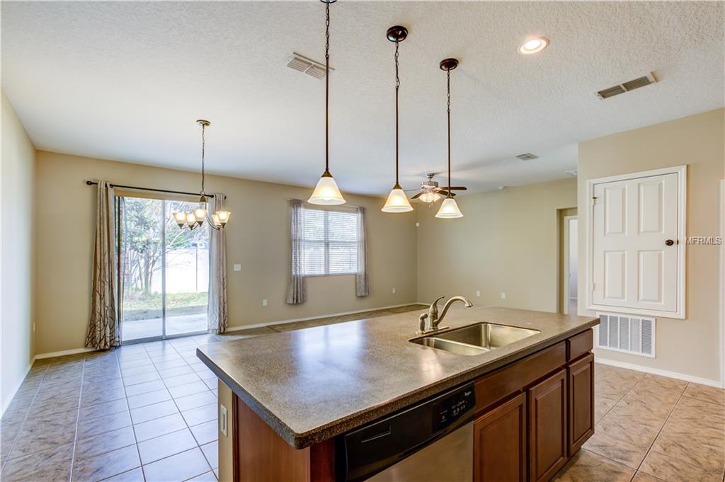 1755 COLLEGE PARK DRIVE, TAVARES, Florida 32778, 4 Bedrooms Bedrooms, 8 Rooms Rooms,2 BathroomsBathrooms,Residential,For sale,COLLEGE PARK,G4852745