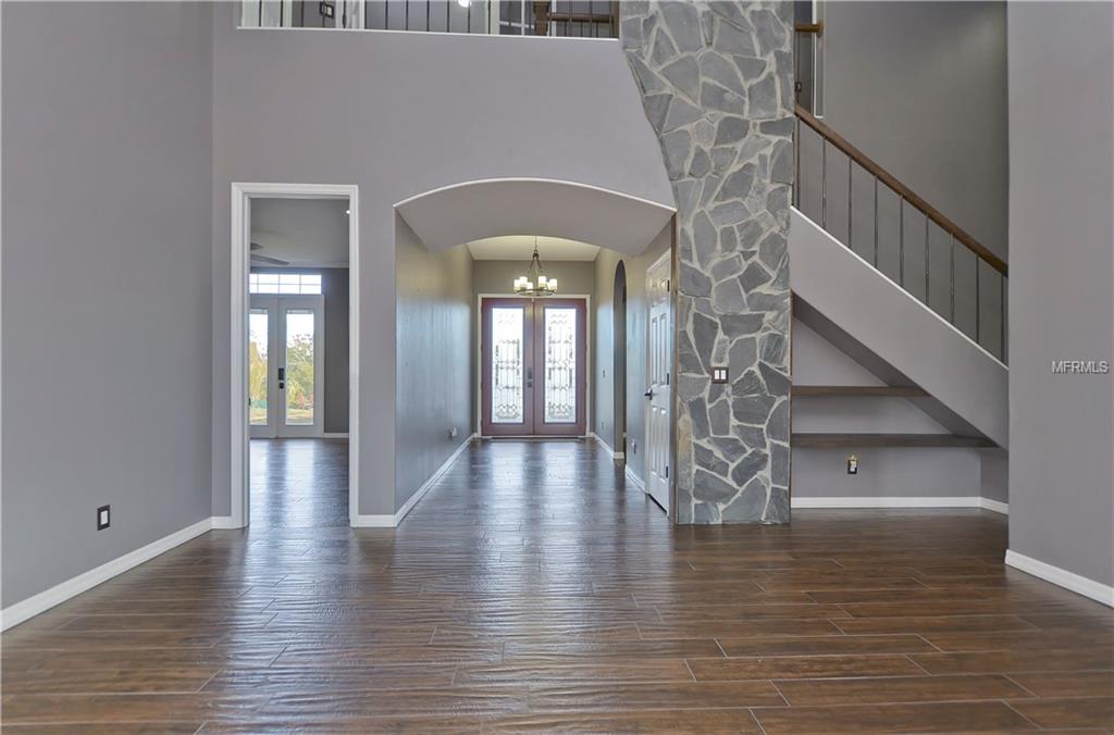 10710 ARROWHEAD LAKE COURT, THONOTOSASSA, Florida 33592, 4 Bedrooms Bedrooms, 6 Rooms Rooms,3 BathroomsBathrooms,Residential,For sale,ARROWHEAD LAKE,A4206701