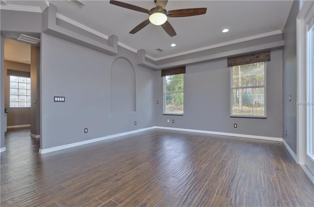 10710 ARROWHEAD LAKE COURT, THONOTOSASSA, Florida 33592, 4 Bedrooms Bedrooms, 6 Rooms Rooms,3 BathroomsBathrooms,Residential,For sale,ARROWHEAD LAKE,A4206701