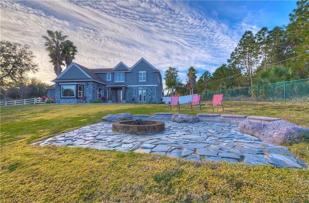 10710 ARROWHEAD LAKE COURT, THONOTOSASSA, Florida 33592, 4 Bedrooms Bedrooms, 6 Rooms Rooms,3 BathroomsBathrooms,Residential,For sale,ARROWHEAD LAKE,A4206701