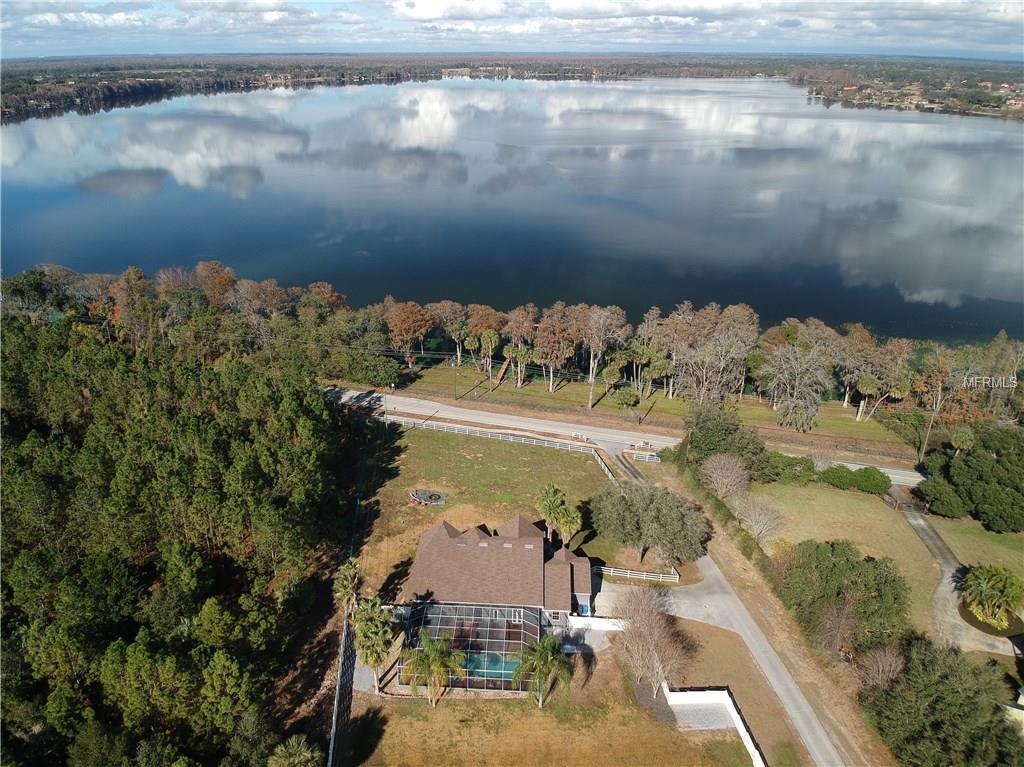 10710 ARROWHEAD LAKE COURT, THONOTOSASSA, Florida 33592, 4 Bedrooms Bedrooms, 6 Rooms Rooms,3 BathroomsBathrooms,Residential,For sale,ARROWHEAD LAKE,A4206701