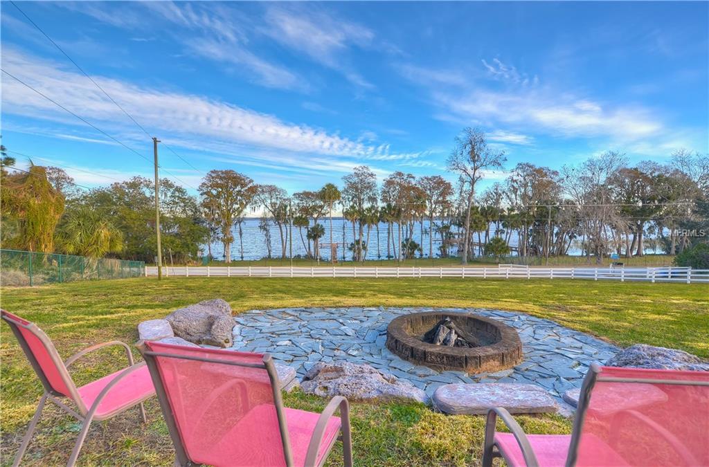 10710 ARROWHEAD LAKE COURT, THONOTOSASSA, Florida 33592, 4 Bedrooms Bedrooms, 6 Rooms Rooms,3 BathroomsBathrooms,Residential,For sale,ARROWHEAD LAKE,A4206701