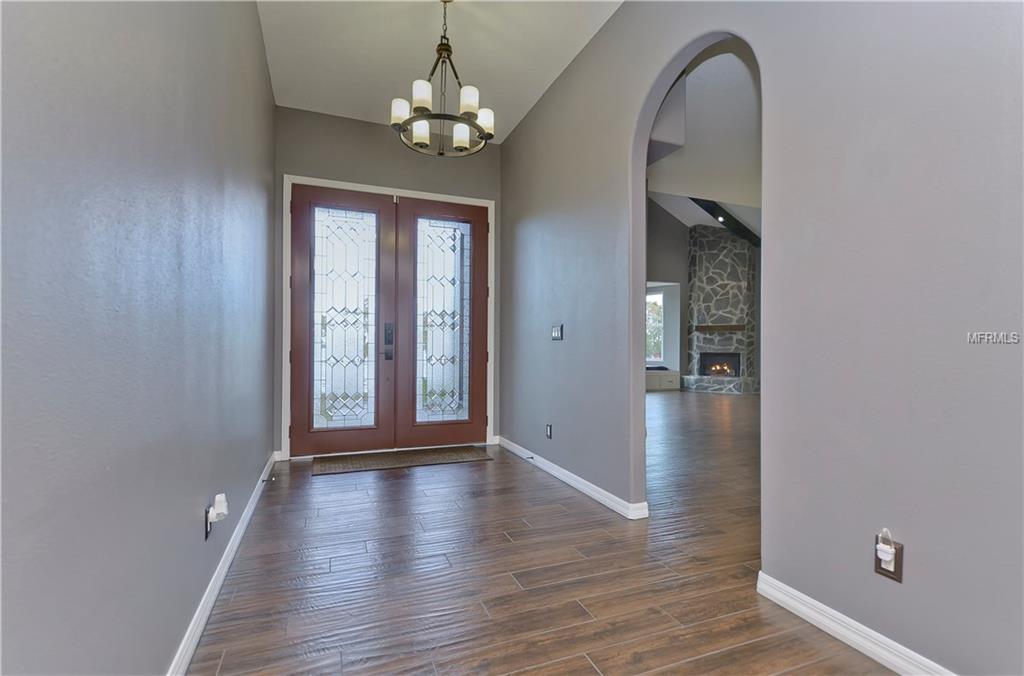 10710 ARROWHEAD LAKE COURT, THONOTOSASSA, Florida 33592, 4 Bedrooms Bedrooms, 6 Rooms Rooms,3 BathroomsBathrooms,Residential,For sale,ARROWHEAD LAKE,A4206701