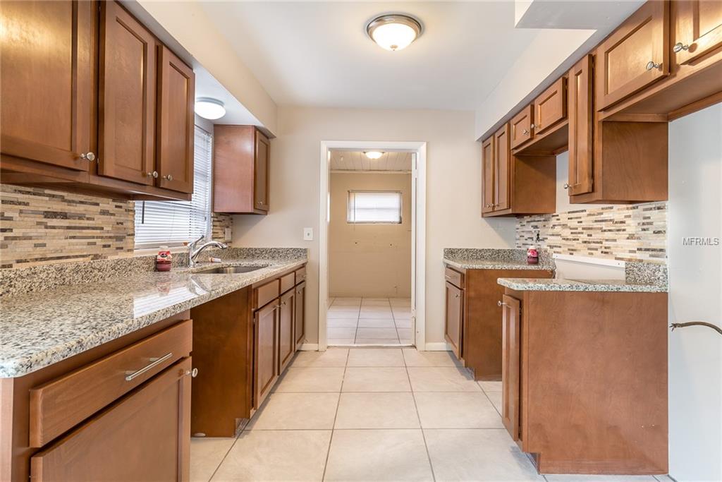 5015 KEITH PLACE, ORLANDO, Florida 32808, 4 Bedrooms Bedrooms, 3 Rooms Rooms,1 BathroomBathrooms,Residential,For sale,KEITH,T2922987