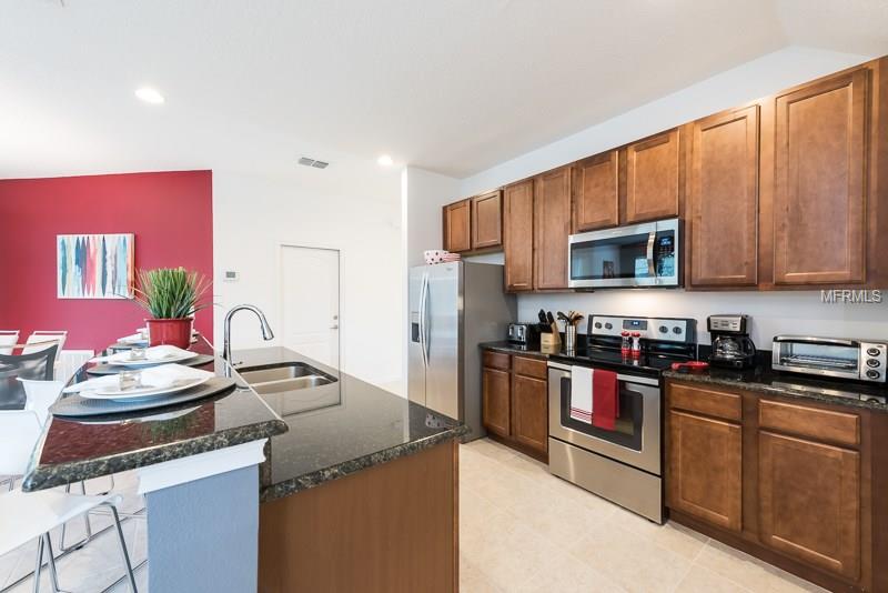 2638 TRANQUILITY WAY, KISSIMMEE, Florida 34746, 4 Bedrooms Bedrooms, 6 Rooms Rooms,4 BathroomsBathrooms,Residential,For sale,TRANQUILITY,O5561959