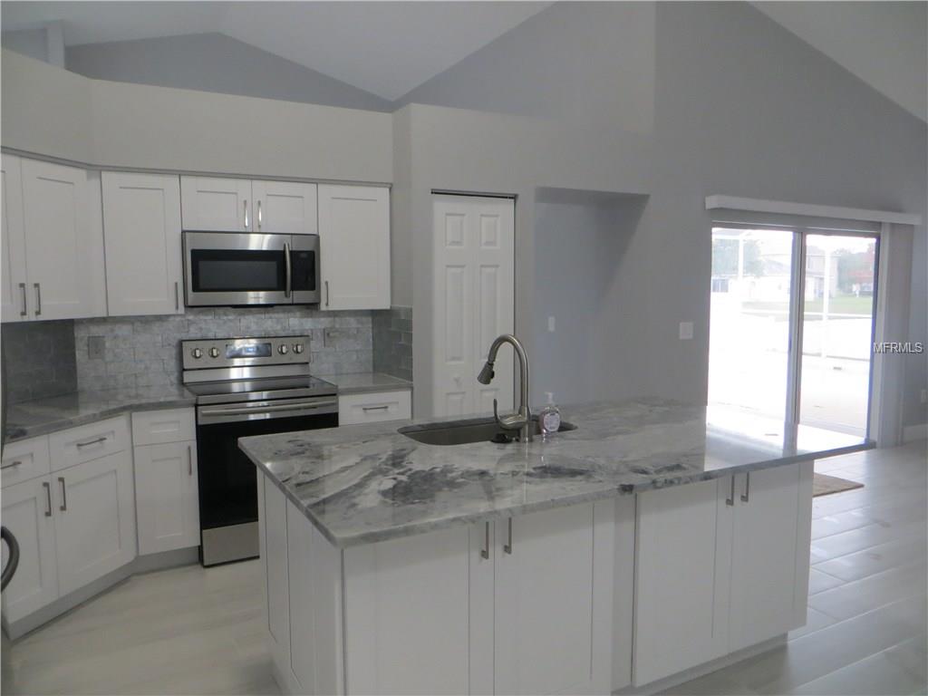 4735 BALSAM DRIVE, LAND O LAKES, Florida 34639, 4 Bedrooms Bedrooms, 8 Rooms Rooms,3 BathroomsBathrooms,Residential,For sale,BALSAM,T2928048